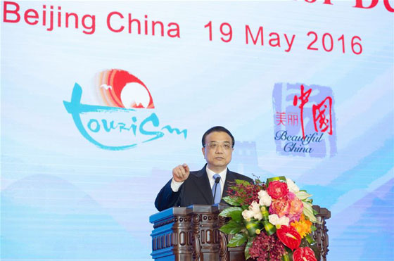 Chinese Premier Li Keqiang delivers a speech at the opening ceremony of the First World Conference on Tourism for Development in Beijing, capital of China, May 19, 2016. [Photo/Xinhua]