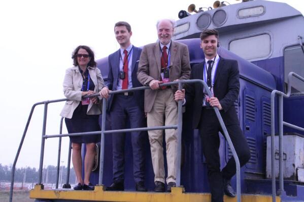 Delegates visit a train that runs from Zhengzhou to several EU countries including Germany and France while touring the Zhengzhou International Hub Development and Construction Co., Ltd on May 19.