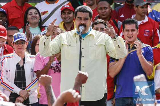 Venezuelan President Nicolas Maduro (C) delivers a speech during a rally in Caracas, Venezuela, on June 1, 2016. [Photo/Xinhua]