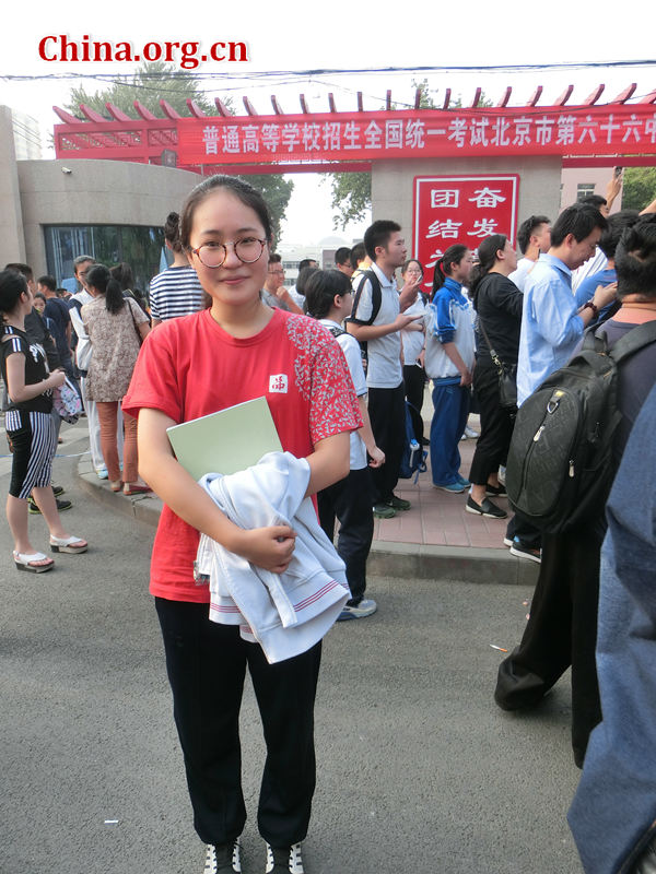 She feels very tired after the examination, and she wants to take a long sleep and relax, but, she does feel happy and relax when she finished all the examination. [Photo by Yu Winglam / China.org.cn]