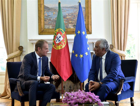 Portuguese Prime Minister Antonio Costa (R) speaks with European Council President Donald Tusk during their meeting at Sao Bento Palace in Lisbon, Portugal on June 20, 2016. [Photo/Xinhua]