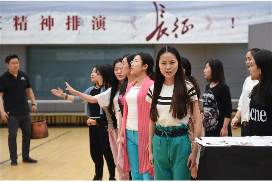 Actresses practice during rehearsal of their new opera The Long March in Beijing, capital of China, June 16, 2016. In order to commemorate the 80th anniversary of the victory of Red Army's Long March, National Centre for the Performing Arts invited domestic first-class artists including Yin Qing, Zou Jingzhi, Tian Qinxin and Yang Xiaoyang to constitute the creative group of opera The Long March. The opera will premier from July 1 to July 6. (Xinhua/Luo Xiaoguang) 