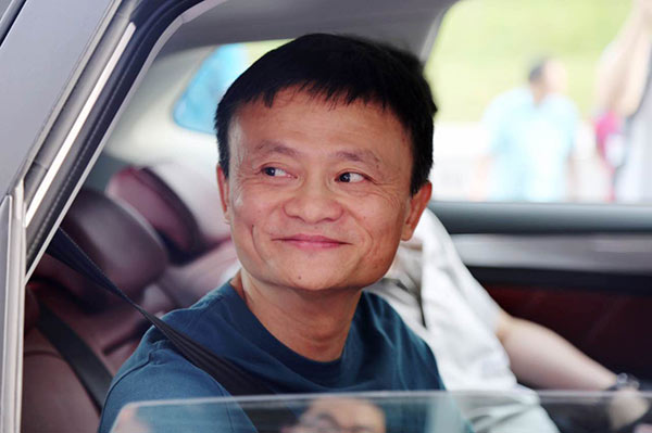 Alibaba's Executive Chairman Jack Ma takes a test ride on OS' Car, its internet-enabled vehicle jointly developed with SAIC Motor Corp on July 6, 2016 in Hangzhou, Zhejiang province. [Photo/China Daily]