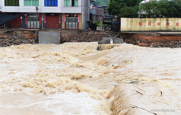 Photo taken on July 9, 2016 shows flood in Meifeng Village of Yangzhong Township in Youxi County, southeast China's Fujian Province. Torrential rain brought by typhoon Nepartak has affected over 1,800 people, damaged houses of 94 families and about 400 hectares of farmland in Youxi. [Xinhua]      