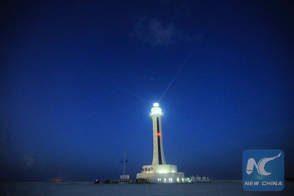 Photo taken on April 5, 2016 shows the lighthouse on Zhubi Reef of Nansha Islands in the South China Sea, south China. [Photo: Xinhua/Xing Guangli] 