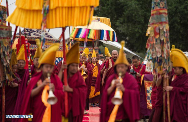 The 11th Panchen Lama Bainqen Erdini Qoigyijabu held a four-day Kalachakra ceremony starting from July 21, 2016, in Shigatse, southwest China's Tibet Autonomous Region, attracting about 50,000 Buddhists and monks. It is the first time for the young, 11th Panchen Lama to hold this event. [Photo: Xinhua]