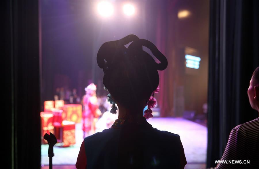 Actors of Hebei Bangzi perform on stage during 2016 China Hebei Bangzi Festival in Gu&apos;an, north China&apos;s Hebei Province, July 29, 2016. Hebei Bangzi, or Hebei Opera, is the main type of opera in Hebei Province which became popular in Qing Dynasty (1644-1911). Like Peking Opera, it&apos;s a traditional Chinese opera which combines music, vocal performance, dance, acrobatics and etc. (Xinhua/Cai Yang) 