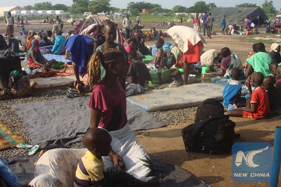 Displaced civilians taking refuge at the Tomping base of the UN Mission in South Sudan (UNMISS), in the wake of fresh clashes in Juba between soldiers of the Sudan People's Liberation Army (SPLA) and the SPLA in Opposition (SPLA-IO). [Photo/Xinhua]