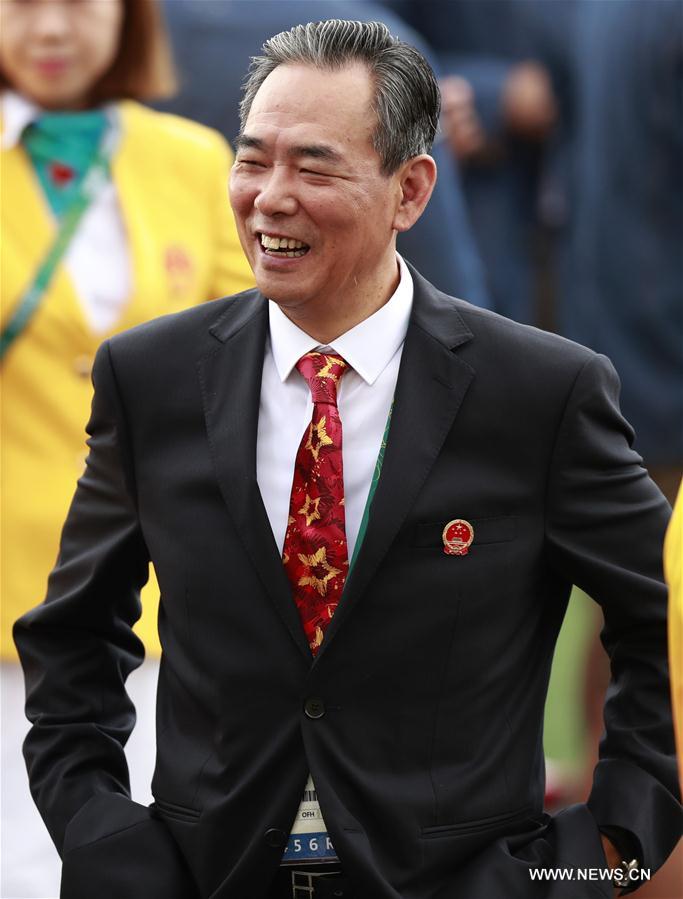 Deputy chef de mission of Chinese delegation Cai Zhenhua attends the flag-raising ceremony at the Olympic Village in Rio de Janeiro, Brazil, on Aug. 3, 2016. (Xinhua/Ren Zhenglai) 