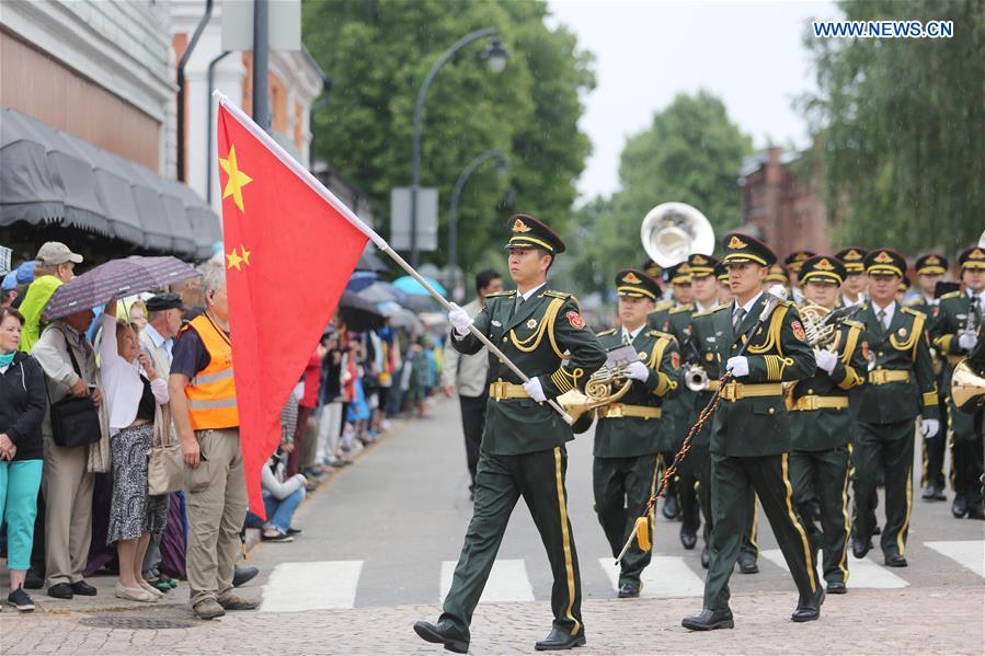 Chinese Military Band of the People&apos;s Liberation Army perform march show on the Hamina Tattoo International Military Music Event in Hamina, Finland, Aug. 4, 2016. (Xinhua/Zhang Xuan) 