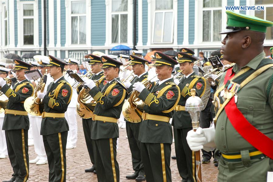 Chinese Military Band of the People&apos;s Liberation Army join a multi-national tattoo parade on the Hamina Tattoo International Military Music Event in Hamina, Finland, Aug. 4, 2016. (Xinhua/Zhang Xuan) 