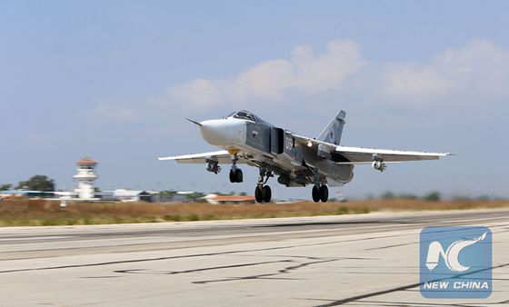 A file picture taken on October 3, 2015 shows a Russian Sukhoi Su-24 bomber taking off from the Hmeimim airbase in the Syrian province of Latakia. [Photo/Xinhua]