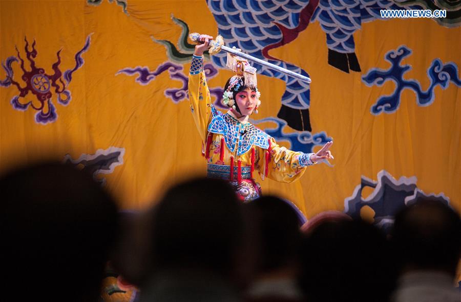 An artist performs Peking Opera during a reopening ceremony for the Sanqingyuan Opera House in Beijing, capital of China, Aug 18, 2016. Located on Qianmen Street, Sanqingyuan once was well-known as one of 'the Seven Opera Houses in Beijing,' then was changed to be a part of the Dashilan shopping district. After three years' construction based on its old pictures, the place reopened on Thursday as an opera house again. [Photo/Xinhua]