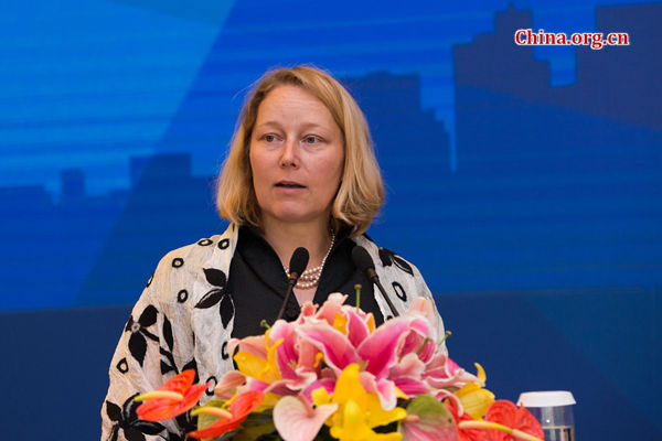 Agi Veres, the UN resident representative and the UNDP country director in China, speaks at the launch of the China National Human Development Report 2016 on Aug. 22 in Beijing. [Photo by Chen Boyuan / China.org.cn]