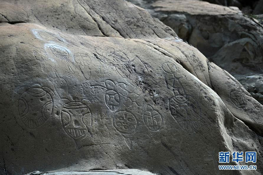 Floods cause substantial damage to prehistoric cliff paintings at Helan Mountain in northwest China's Ningxia Hui Autonomous Region, August 24, 2016. [Photo: Xinhua]