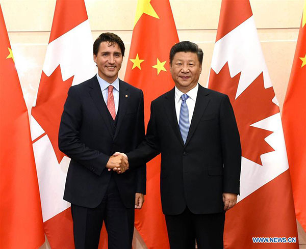 Chinese President Xi Jinping (R) meets with Canadian Prime Minister Justin Trudeau in Beijing, Aug 31, 2016. [Photo/Xinhua]