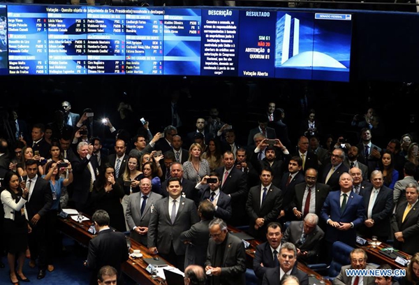 Senators participate in the final vote of the impeachment against Brazil's suspended President Dilma Rousseff at the Senate in Brasilia, Brazil, on Aug. 31, 2016. 