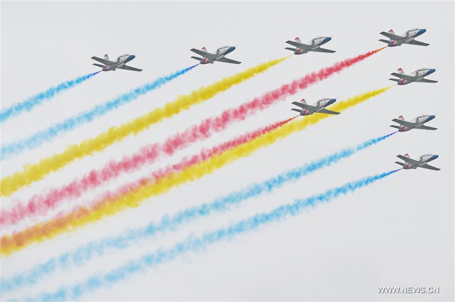 The Red Falcon Air Demonstration Team performs in the sky during the PLA Air Force Aviation Open Day in Changchun, capital city of northeast China&apos;s Jilin Province, Sept. 2, 2016. The open day aims to demonstrate the achievements of Chinese People&apos;s Liberation Army (PLA) air force and enhance the public awareness of aerospace safety. Some equipments of the PLA air force will be open to the public for the first time. (Xinhua/Zhang Nan) 