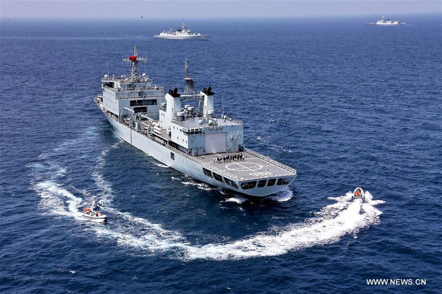 Chinese frigate 'Huangshan' sends marines to search a suspicious ship during a China-Russia naval joint drill at sea off south China's Guangdong Province, Sept. 16, 2016. Chinese and Russian fleets conducted joint operation exercise off Guangdong Province in the South China Sea during the 'Joint Sea 2016' drill on Friday. [Photo/Xinhua]