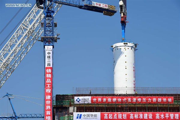 The pressure valve of a high-temperature gas-cooled reactor (HTGR) is installed at the Huaneng Shidao Bay nuclear power plant, Shandong Province, March 20, 2016. [Photo: Xinhua]