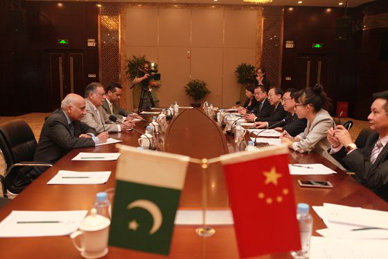 Luo Shugang, Chinese minister of culture meets with Pakistan's Federal Minister for Information, Broadcasting and National Heritage Pervaiz Rashid in Dunhuang city of Gansu province, China on Sept. 19, 2016.