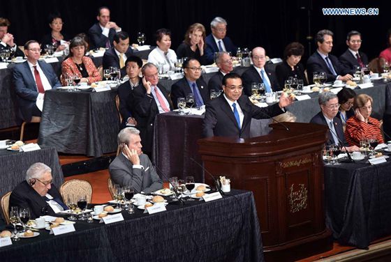 Chinese Premier Li Keqiang (C on stage) addresses a welcoming dinner party organized by the Economic Club of New York, the National Committee on U.S.-China Relations and the U.S.-China Business Council in New York, Sept. 20, 2016. [Photo/Xinhua]