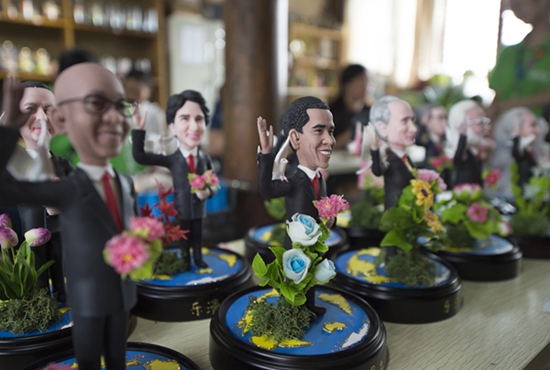 Clay figures featuring the leaders to attend the G20 Summit seen in Hangzhou, Zhejiang Province, Sept. 1, 2016. Made by artist Wu Xiaoli with the name 'Dream of World Peace', the clay figures were displayed at Hangzhou's Qiaoxi historic block.