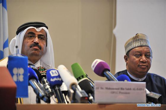 Organization of Petroleum Producing Countries (OPEC) Secretary General Mohammad Sanusi Barkindo (R) and President of OPEC Mohammed Bin Saleh Al-Sada attend a press conference in Algiers, Algeria on Sept. 28, 2016.[Photo/Xinhua]