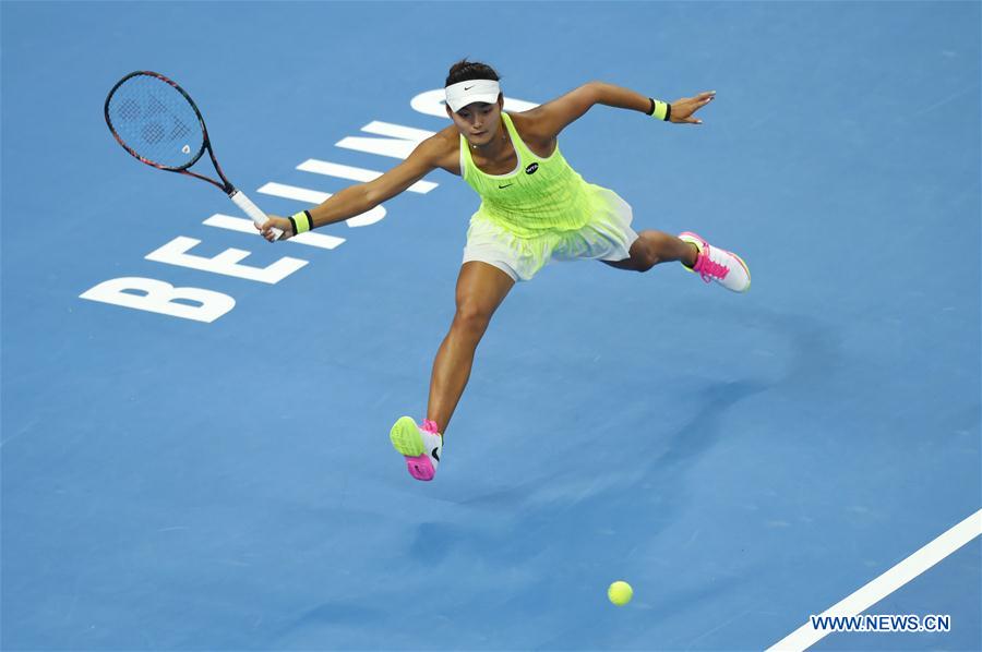 China's Wang Yafan returns the ball during the women's singles second round match against Czech Republic's Petra Kvitova at the China Open tennis tournament in Beijing, capital of China, Oct. 4, 2016. [Photo/Xinhua]