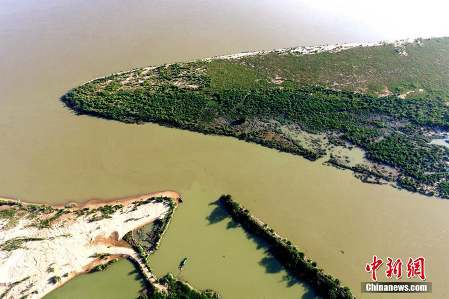 Aerial photo taken on Oct. 3, 2016 shows scenery of the wetland park in Minhou County, southeast China's Fujian Province. [Photo/Chinanews.com]