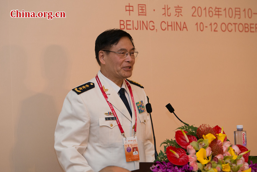 Admiral Sun Jianguo, deputy chief of the Joint Staff Department of China's Central Military Commission and chairman of the China Institute for International Strategic Studies, delivers a welcome speech on Oct. 10 at the opening reception for the 7th Xiangshan Forum held in Beijing. [Photo by Chen Boyuan / China.org.cn] 