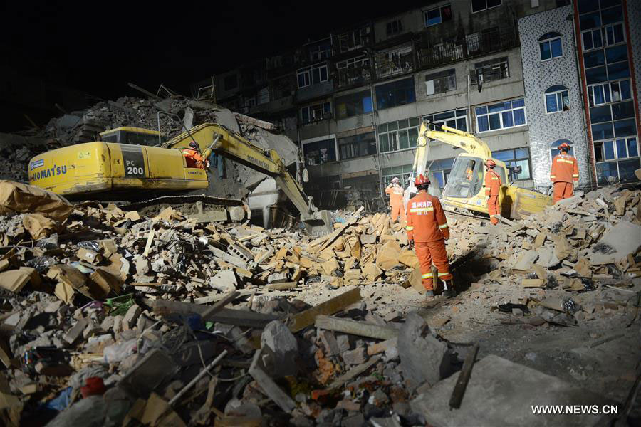 Rescuers search for survivors at the accident site in Lucheng industrial district in Wenzhou, east China's Zhejiang Province, Oct. 11, 2016. [Photo: Xinhua]