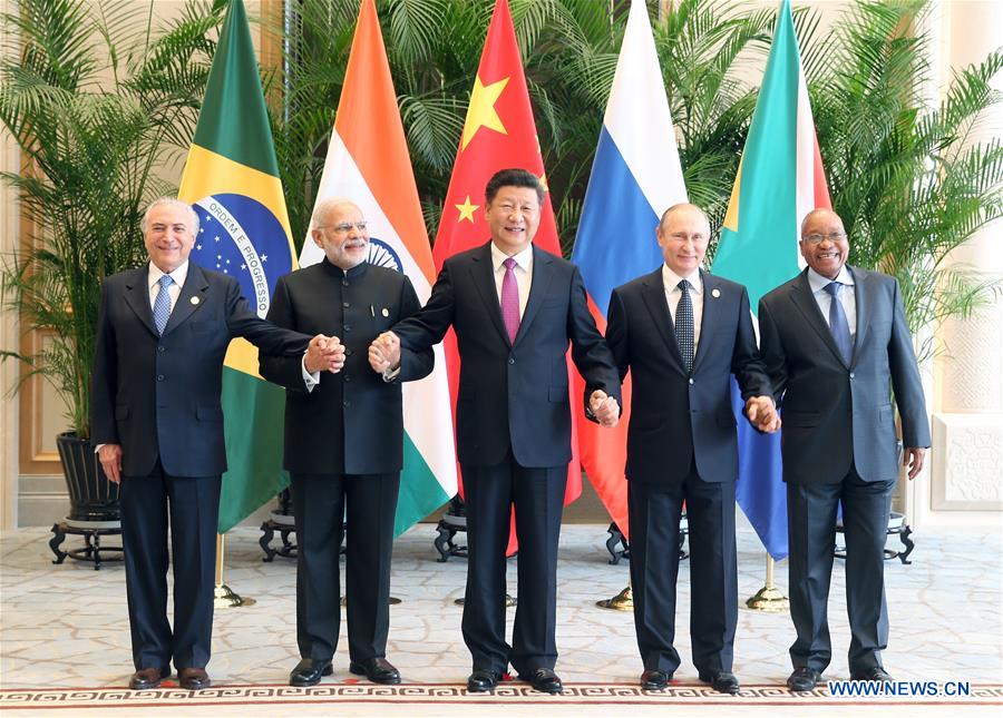 Chinese President Xi Jinping (C), Indian Prime Minister Narendra Modi (2nd L), South African President Jacob Zuma (1st R), Brazilian President Michel Temer (1st L)and Russian President Vladimir Putin attend a BRICS leaders' meeting on the sidelines of a summit of the Group of 20 (G20) major economies in Hangzhou, capital city of east China's Zhejiang Province, Sept. 4, 2016. [Photo/Xinhua]