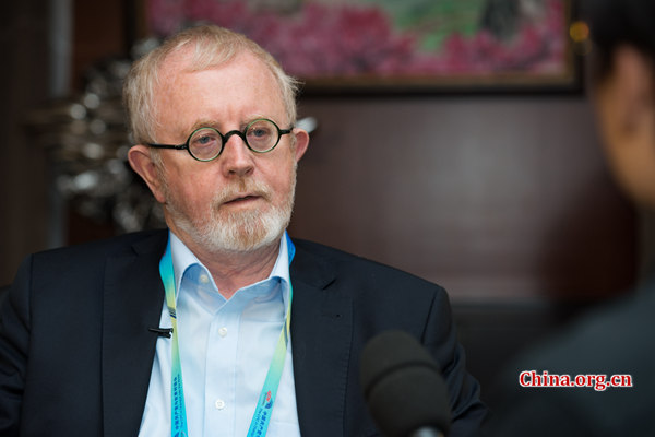 Kjeld Erik Brodsgaard, director of the Asia Research Center at the Copenhagen Business School in Denmark, takes questions on Oct. 13 during the CPC in Dialogue with the World 2016 being held in Chongqing. [Photo by Chen Boyuan / China.org.cn]