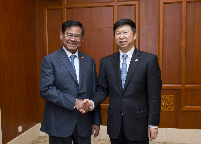 Minister Song Tao of the International Department of the Central Committee of the Communist Party of China (CPC) meets a delegation headed by Sar Kheng, Vice Chairman of Cambodian People's Party and Deputy Prime Minister of Cambodia, on the sidelines of 'The CPC Dialogue with the World 2016,' held in Chongqing from Oct. 13-15.