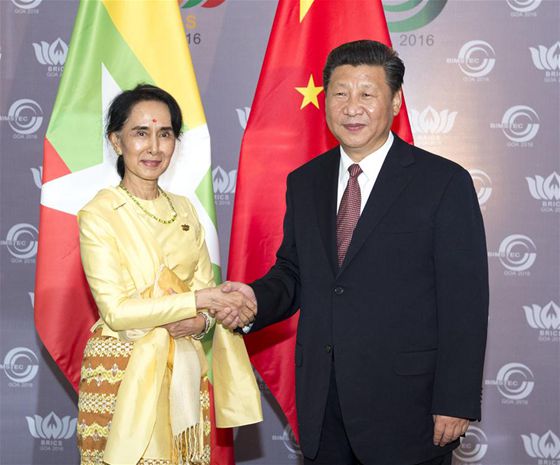 Chinese President Xi Jinping meets with Myanmar's State Counsellor Aung San Suu Kyi in the western Indian state of Goa, Oct. 16, 2016. [Photo/Xinhua]