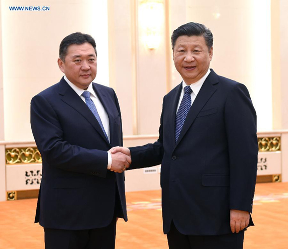 Chinese President Xi Jinping (R) meets with Miyegombo Enkhbold, chairman of the Mongolian People's Party (MPP) and chairman of the State Great Hural, Mongolia's parliament, in Beijing, capital of China, Oct. 18, 2016. Enkhbold attended an annual dialogue between the Communist Party of China and various parties of the world, held in Chongqing Municipality in southwest China last week. (Xinhua/Rao Aimin) 