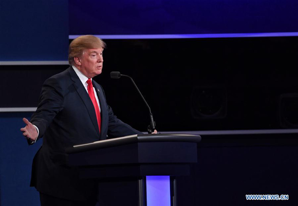 Republican presidential candidate Donald Trump participates in the third and final presidential debate at the University of Nevada Las Vegas (UNLV) in Las Vegas, Nevada, the United States, Oct.19, 2016. (Xinhua/Yin Bogu)