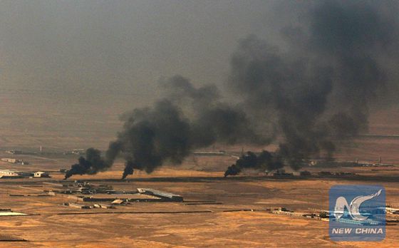 A picture taken from the top of Mount Zardak, about 25 kilometres east of Mosul, shows smoke billowing on the outskirts of the Iraqi city of Nineveh, during an operation against Islamic State (IS) group jihadists, on October 17, 2016. [Photo/Xinhua]