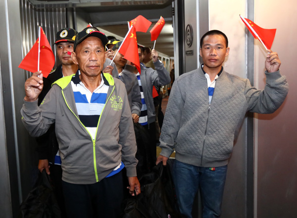 Nine Chinese sailors released by pirates arrive at Baiyun International Airport in Guangzhou on Oct 25, 2016. [Photo/provided to China Daily] 