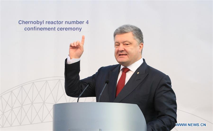 Ukrainian President Petro Poroshenko speaks during the ceremony to unveil the new protective cover over the destroyed Chernobyl nuclear reactor No.4 at Chernobyl nuclear power plant, 110 kilometers north of the Ukrainian capital of Kiev, Nov. 29, 2016. Ukraine on Tuesday unveiled a new protective cover over the destroyed Chernobyl nuclear reactor No.4, which would prevent the leakage of the radiation from the unit during the next century. [Photo/Xinhua]