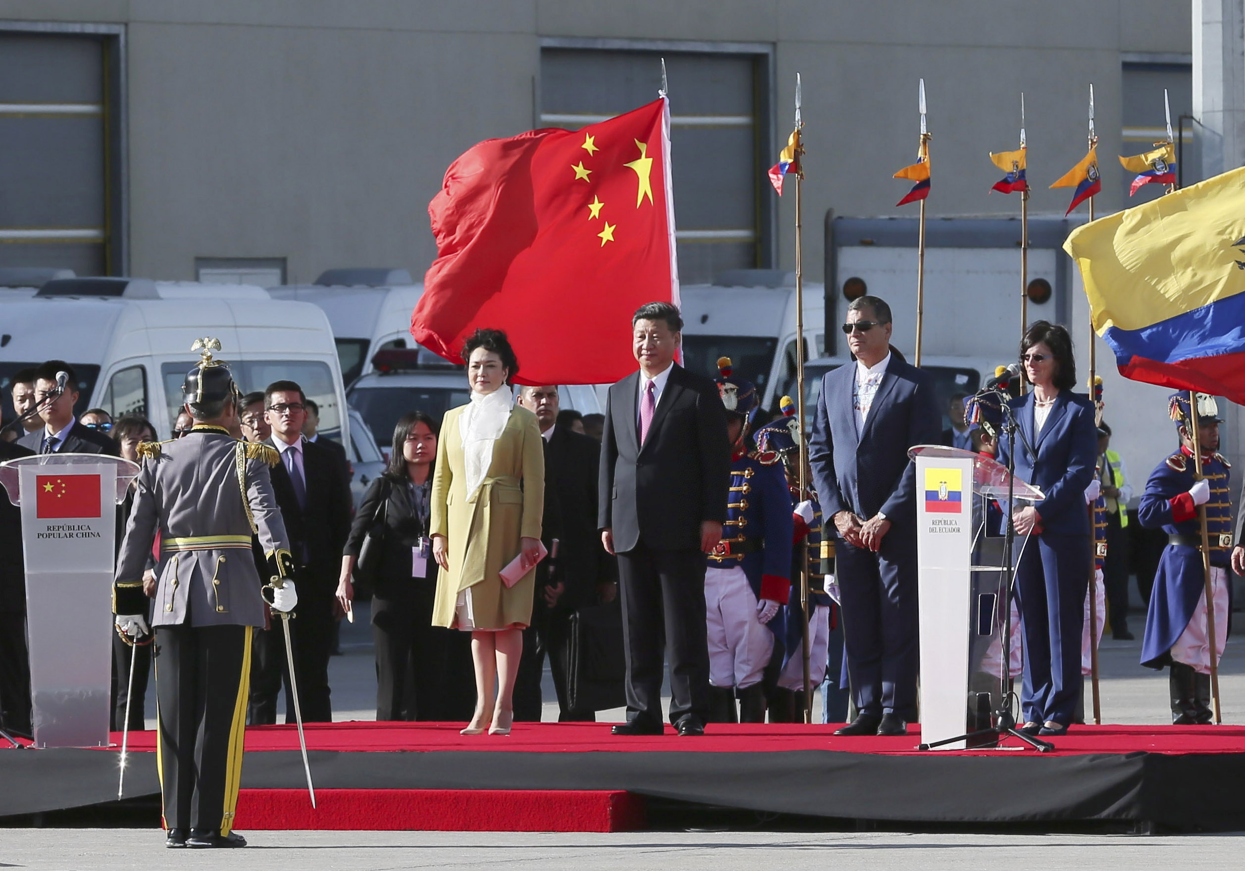 Chinese President Xi Jinping attends a welcome ceremony held by Ecuadorian President Rafael Correa at the airport in Quito, Ecuador, Nov. 17, 2016.