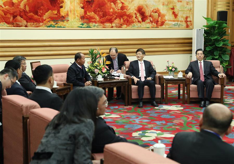 Meng Jianzhu (2nd R, rear), head of the Commission for Political and Legal Affairs of the Communist Party of China (CPC) Central Committee, meets with delegates attending the ministerial meeting which came at the fifth anniversary of the Mekong River law enforcement and security cooperation partnership in Beijing, capital of China, Dec. 27, 2016.(Xinhua/Wang Ye)