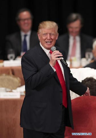 File photo taken on Sept. 15, 2016 shows U.S. Republican presidential candidate Donald Trump delivers a speech during a luncheon meeting of the Economic Club of New York in New York, the United States. Republican candidate Donald Trump was projected by U.S. media early on Nov. 9, 2016 to have won the 270 electoral votes needed for presidency. [Photo/Xinhua]
