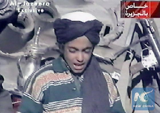 This file frame grab photo taken on Nov. 7, 2001 shows Hamza, who appears to be the youngest son of Saudi born Osamabin Laden, as he recites a poem, in this frame grab taken from the Qatar based al-Jazeera satellite news channel. [Photo/Xinhua]