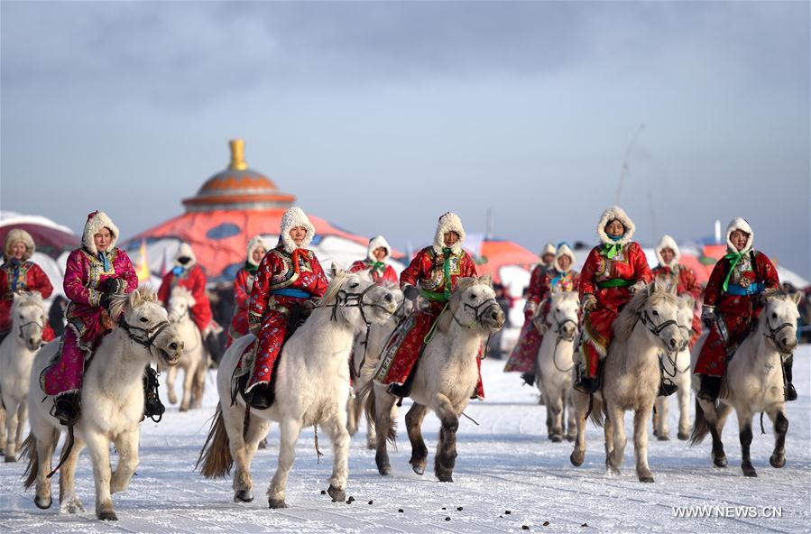 Mongolian women ride horses at the opening ceremony of a winter Nadam fair in West Ujimqin Banner, north China&apos;s Inner Mongolia Autonomous Region, Jan. 7, 2017. The 5-day event kicked off here on Saturday. Nadam Fair, meaning &apos;entertainment&apos; or &apos;recreation&apos; in Mongolian, is a mass traditional Mongolian festival mainly filled with sports events.(Xinhua/Ren Junchuan) 