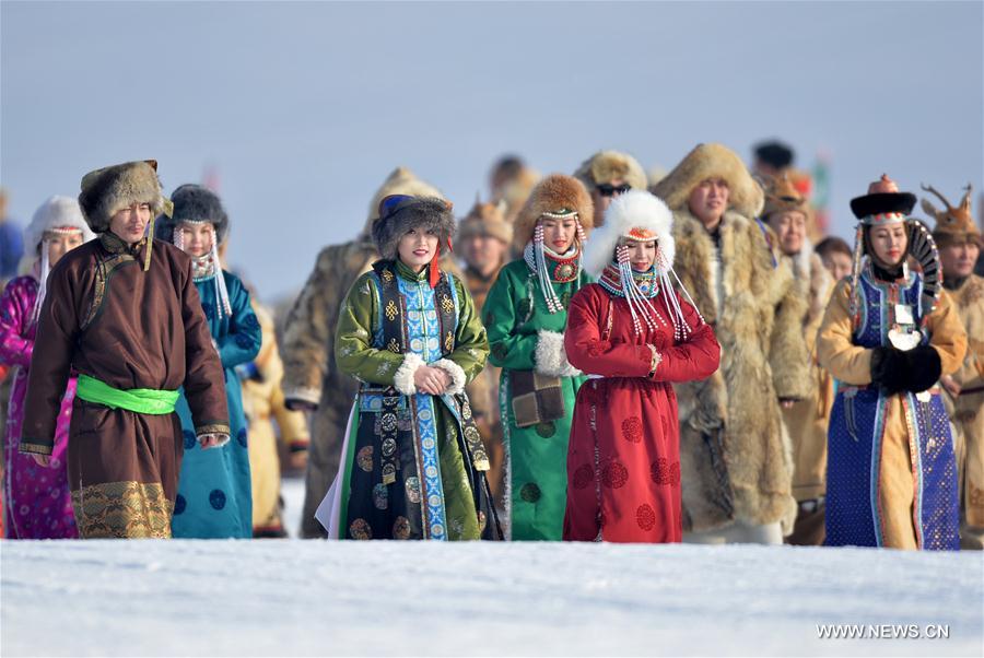 Mongolian people wearing traditional costumes attend the opening ceremony of a winter Nadam fair in West Ujimqin Banner, north China&apos;s Inner Mongolia Autonomous Region, Jan. 7, 2017. The 5-day event kicked off here on Saturday. Nadam Fair, meaning &apos;entertainment&apos; or &apos;recreation&apos; in Mongolian, is a mass traditional Mongolian festival mainly filled with sports events. (Xinhua/Ren Junchuan)