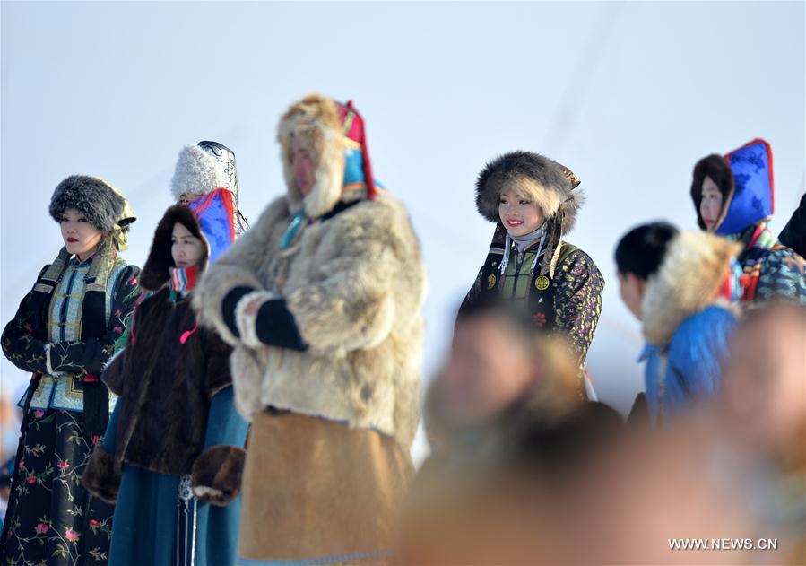 Mongolian people present traditional costumes at the opening ceremony of a winter Nadam fair in West Ujimqin Banner, north China&apos;s Inner Mongolia Autonomous Region, Jan. 7, 2017. The 5-day event kicked off here on Saturday. Nadam Fair, meaning &apos;entertainment&apos; or &apos;recreation&apos; in Mongolian, is a mass traditional Mongolian festival mainly filled with sports events. (Xinhua/Ren Junchuan) 