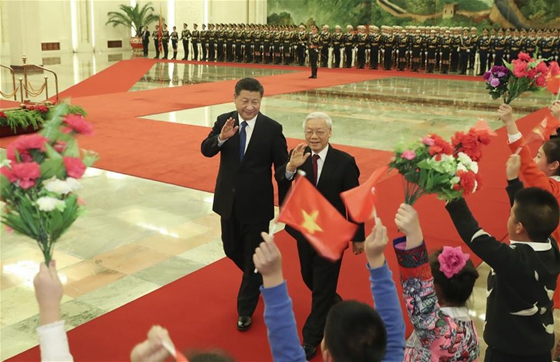Chinese President Xi Jinping (L), who is also General Secretary of the Communist Party of China Central Committee, holds a welcoming ceremony for Nguyen Phu Trong, General Secretary of the Communist Party of Vietnam Central Committee, before their talks in Beijing, capital of China, Jan. 12, 2017. [Photo/Xinhua] 