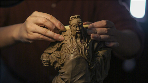 A clay figurine [Photo provided to China Daily]